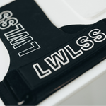 Close-up of a black strap or band with bold white outlined text reading 'LWLSS' on a white surface.